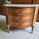 Curved chest of drawers in rosewood and marble marquetry