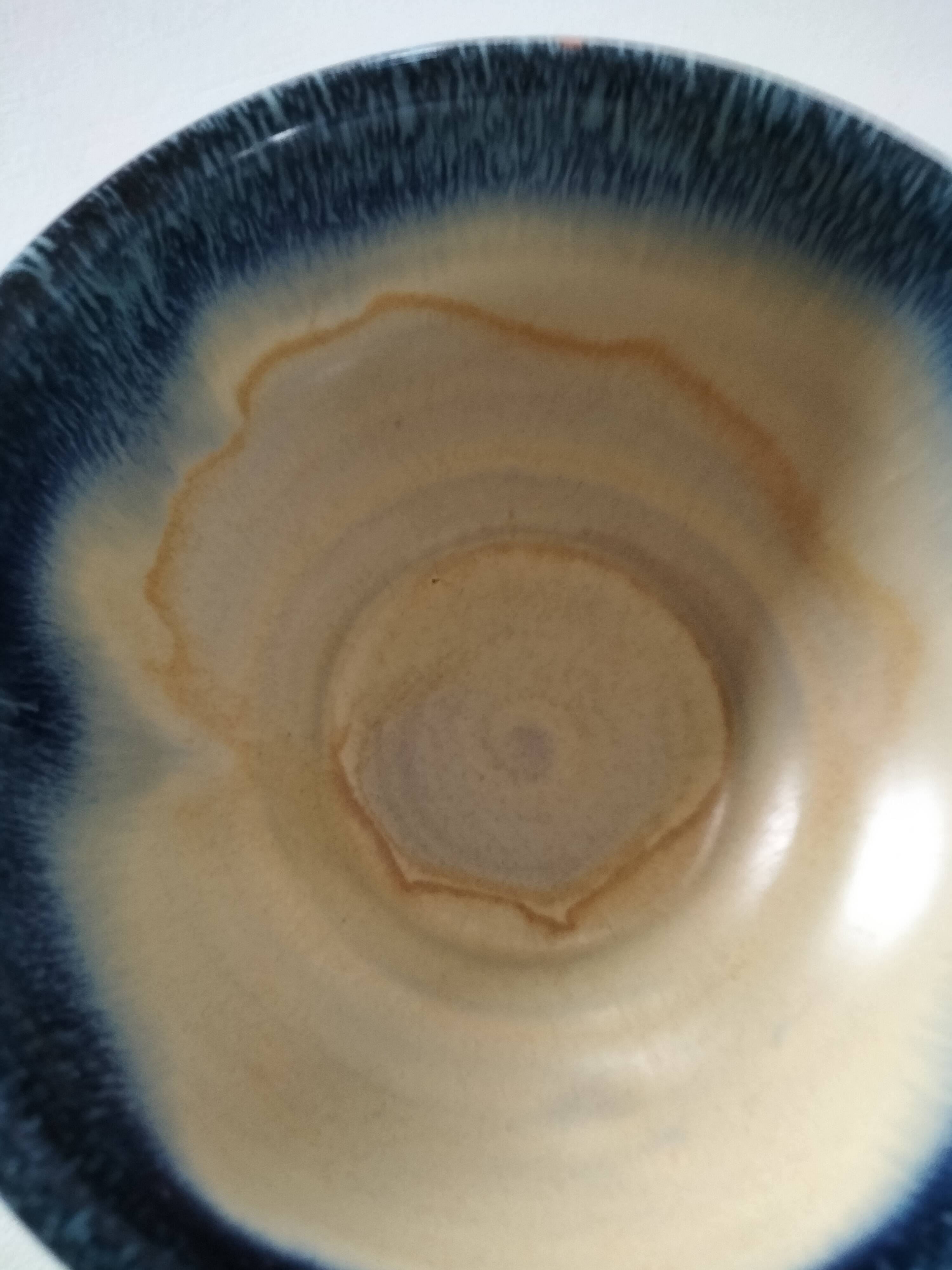 Set of 5 small blue and cream glazed stoneware bowls