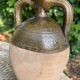 Persimmon glazed terracotta oil jar