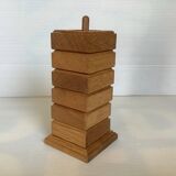 Six wooden egg cups and their Scandinavian style support