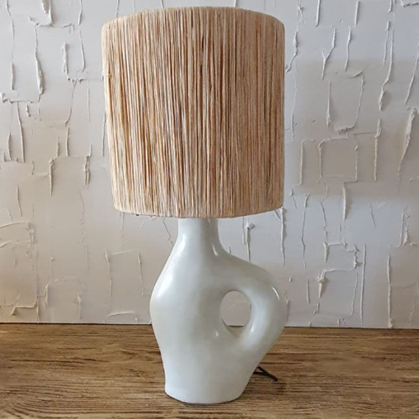Tadelekt lamp with raffia lampshade.