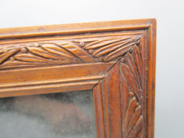 Old frame in worked wood