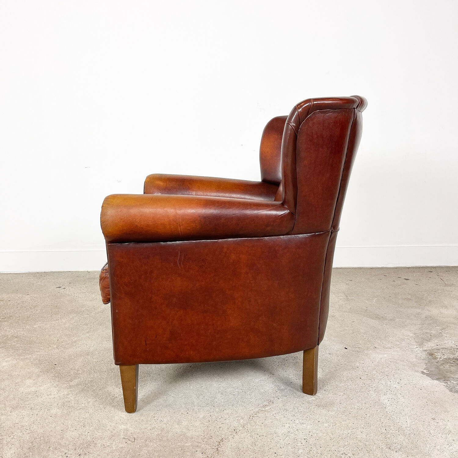 Vintage sheep leather wingback armchair zuna