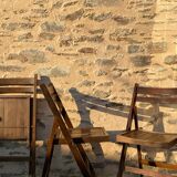 Three wooden folding chairs