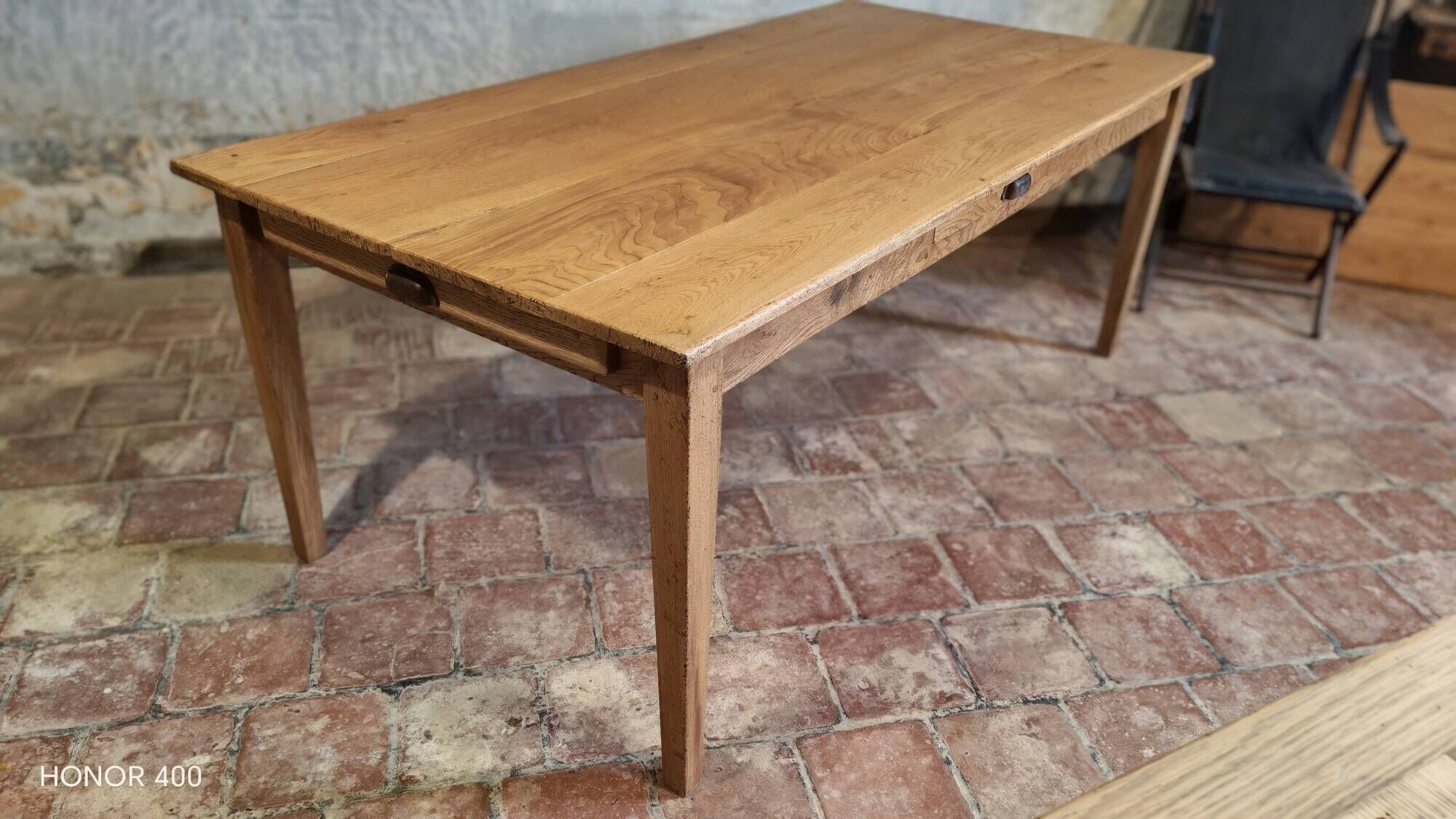 Large authentic farmhouse table made of solid French oak.