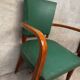 Green faux leather bridge chair