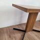 Pivoting coffee table by Pierre Guariche