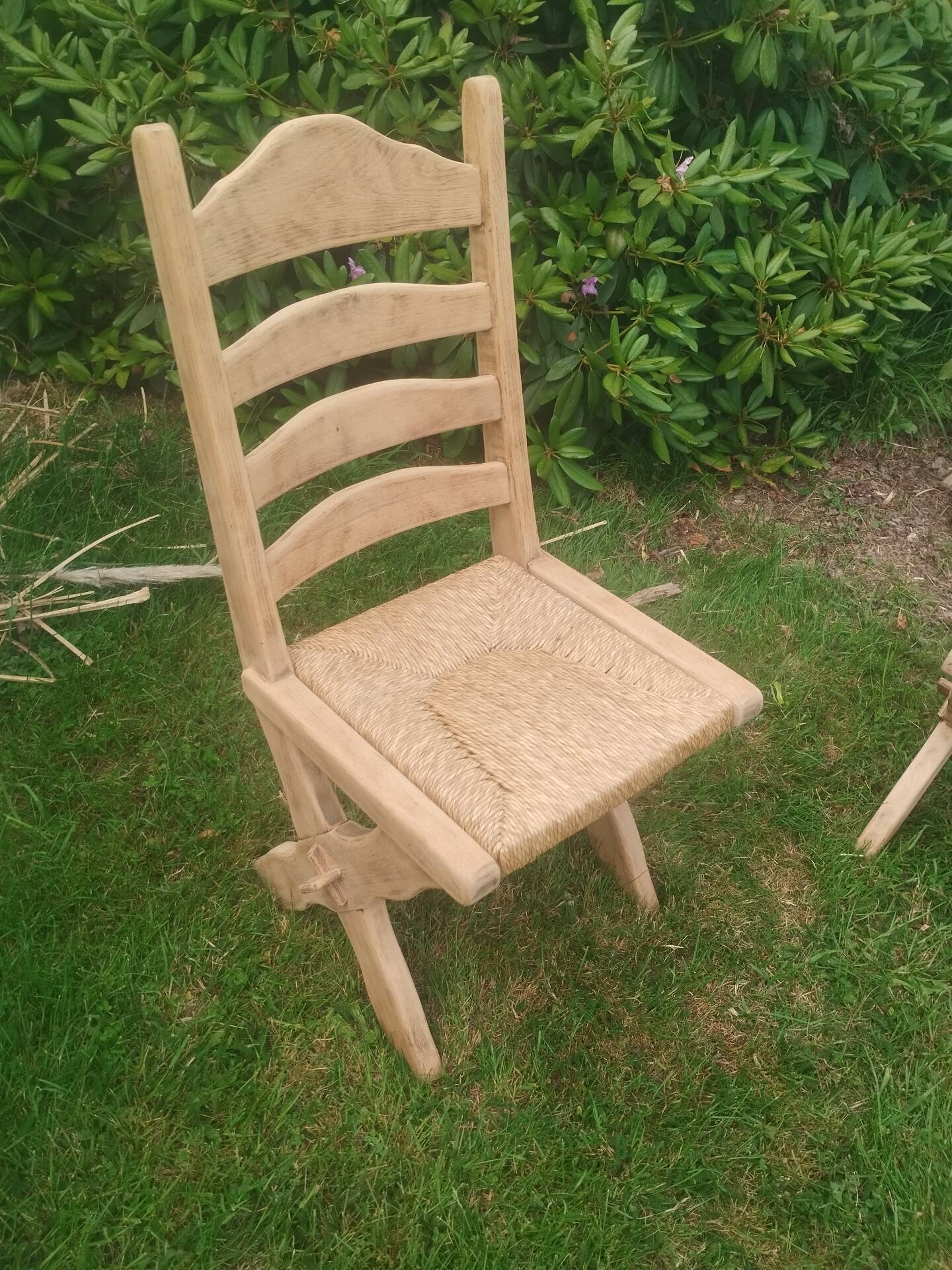Pairs of vintage Scandinavian chairs with splayed legs.