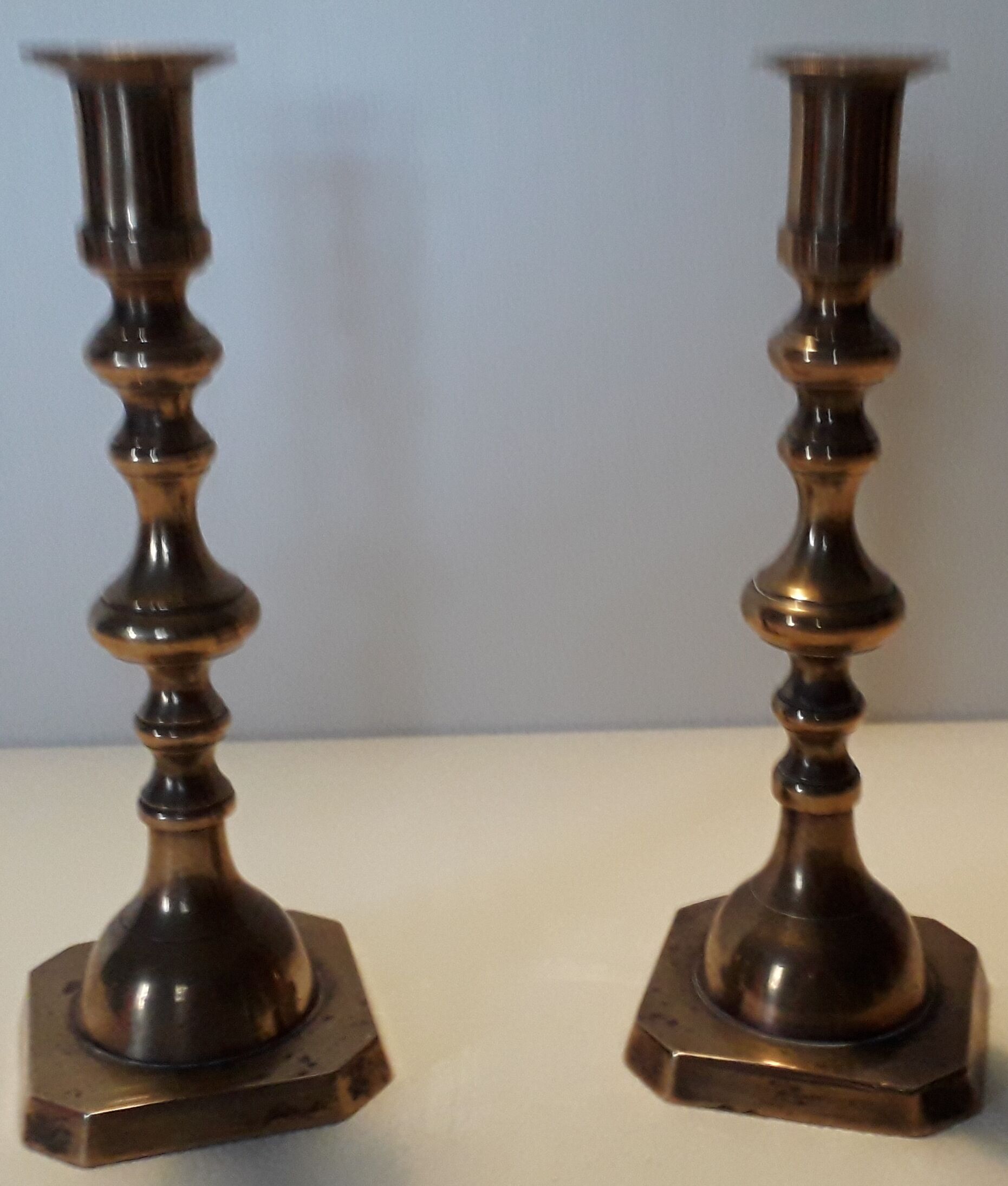 Duo of brass candle holders