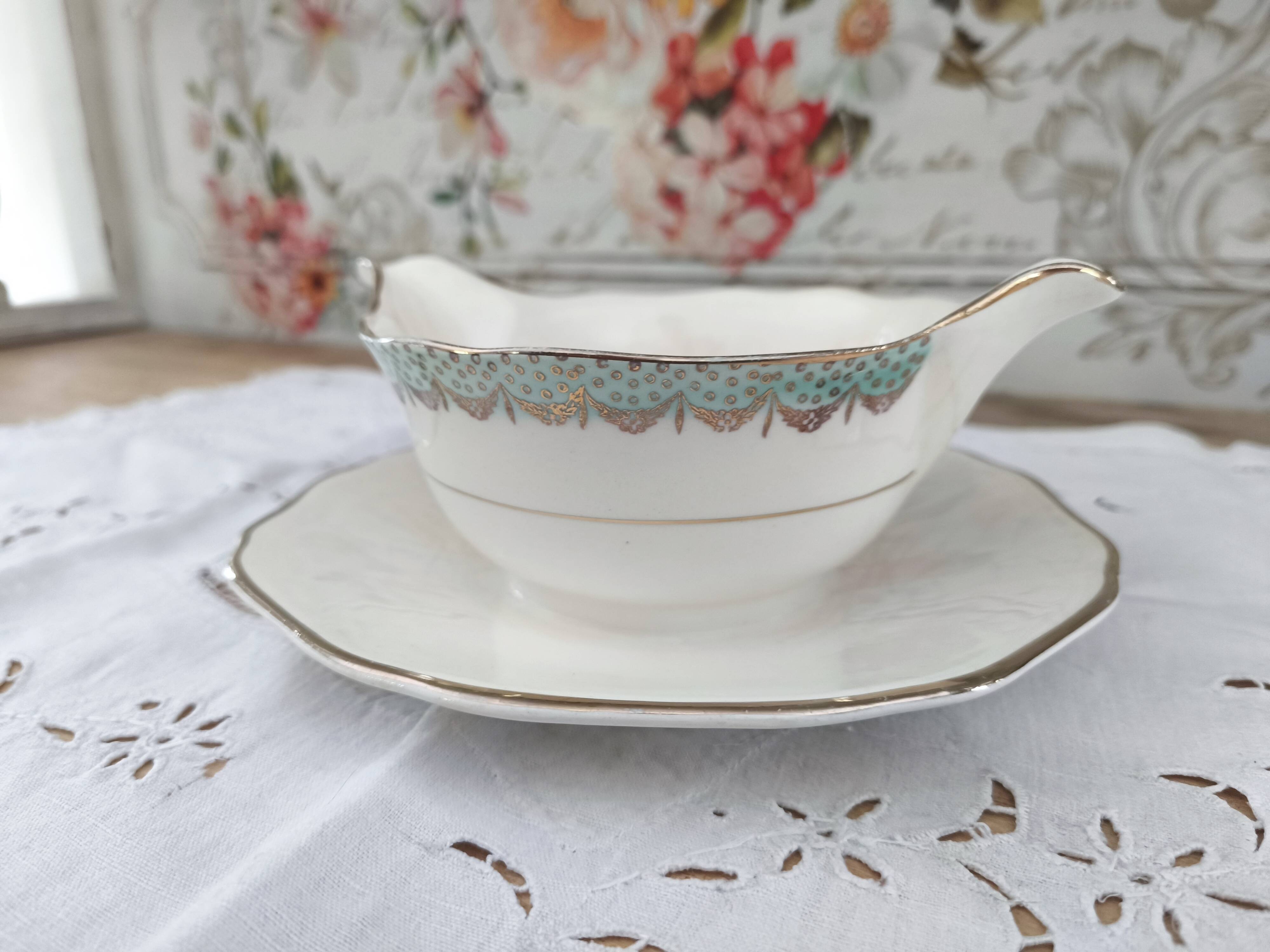 Round sauceboat on Longwy France earthenware frame, Trianon model