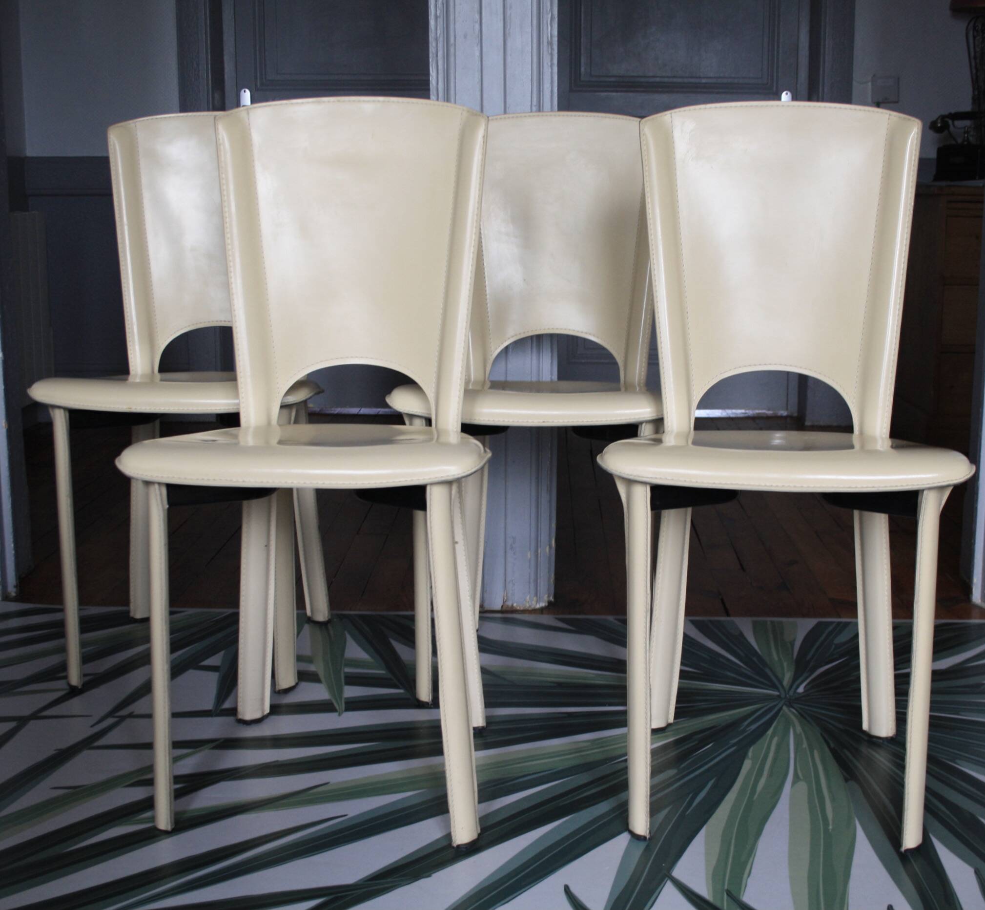 Set of 4 beige leather chairs from the 80s in Italy