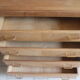 Commode aux pieds compas en bois brut