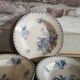 Série de 7 assiettes creuses en faïence Sarreguemines modèle Flore