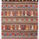 Tapis tribal vintage rouge et vert