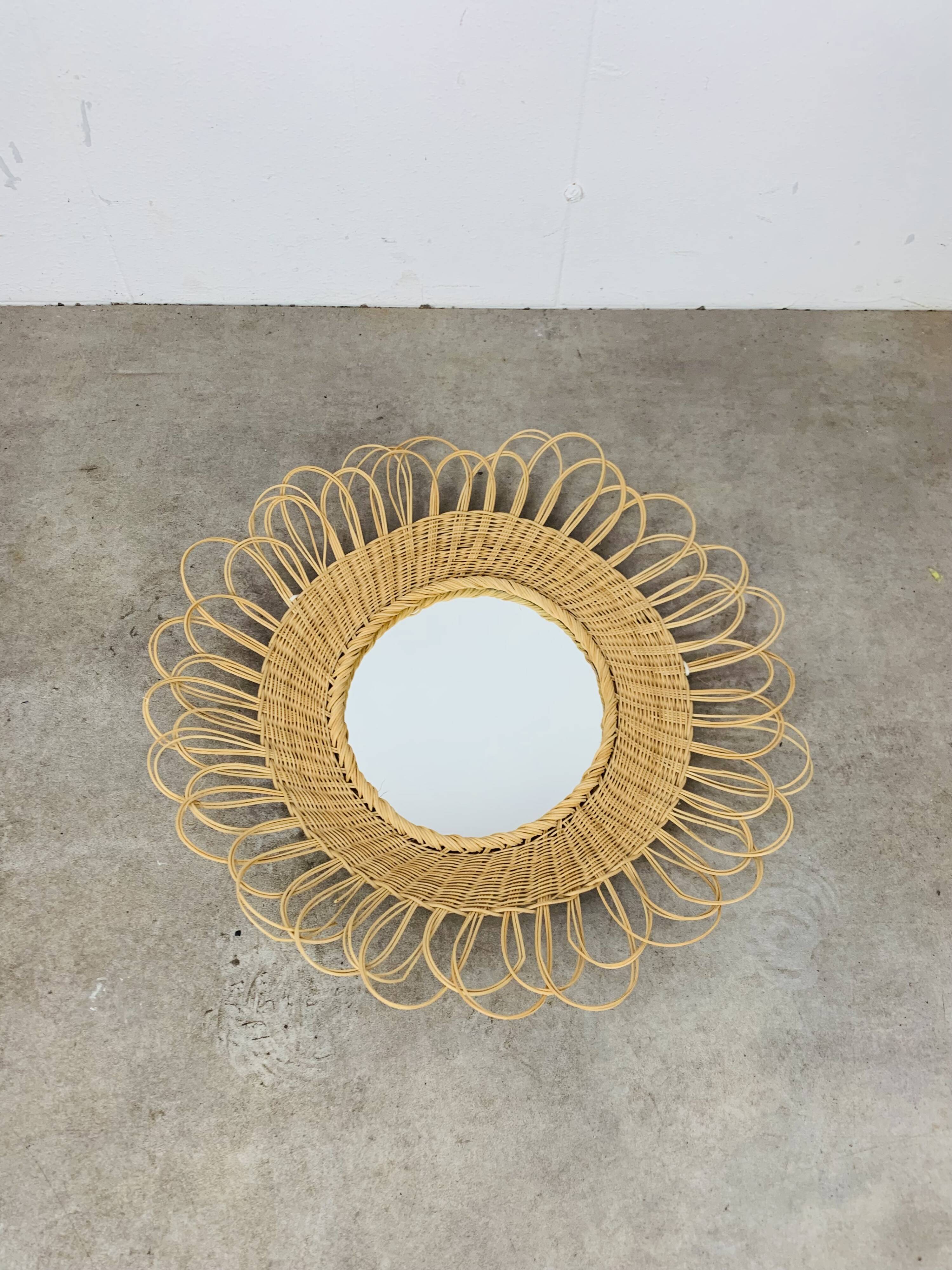 Vintage rattan sun mirror from the 60s