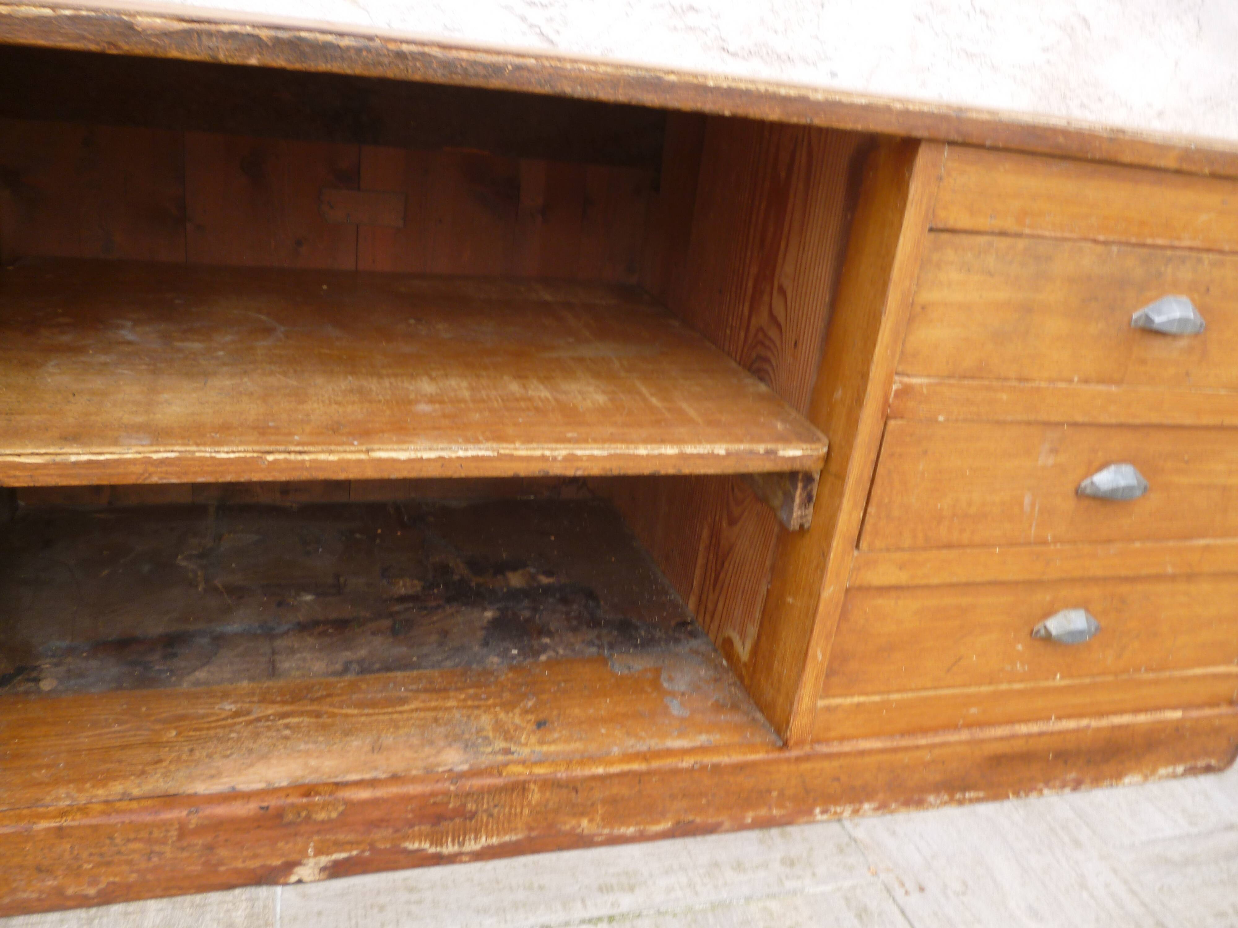 Trompe l'oeil painted store counter pitchpin style