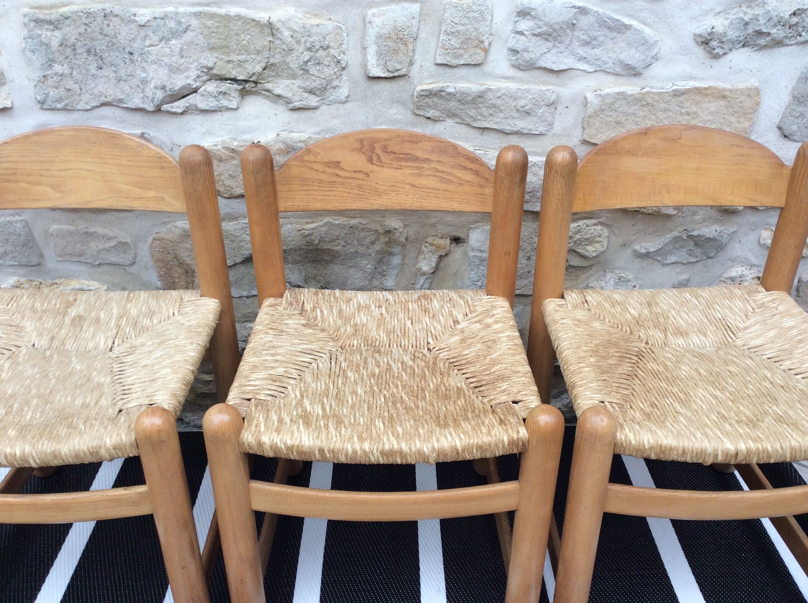 Straw seated wooden chairs