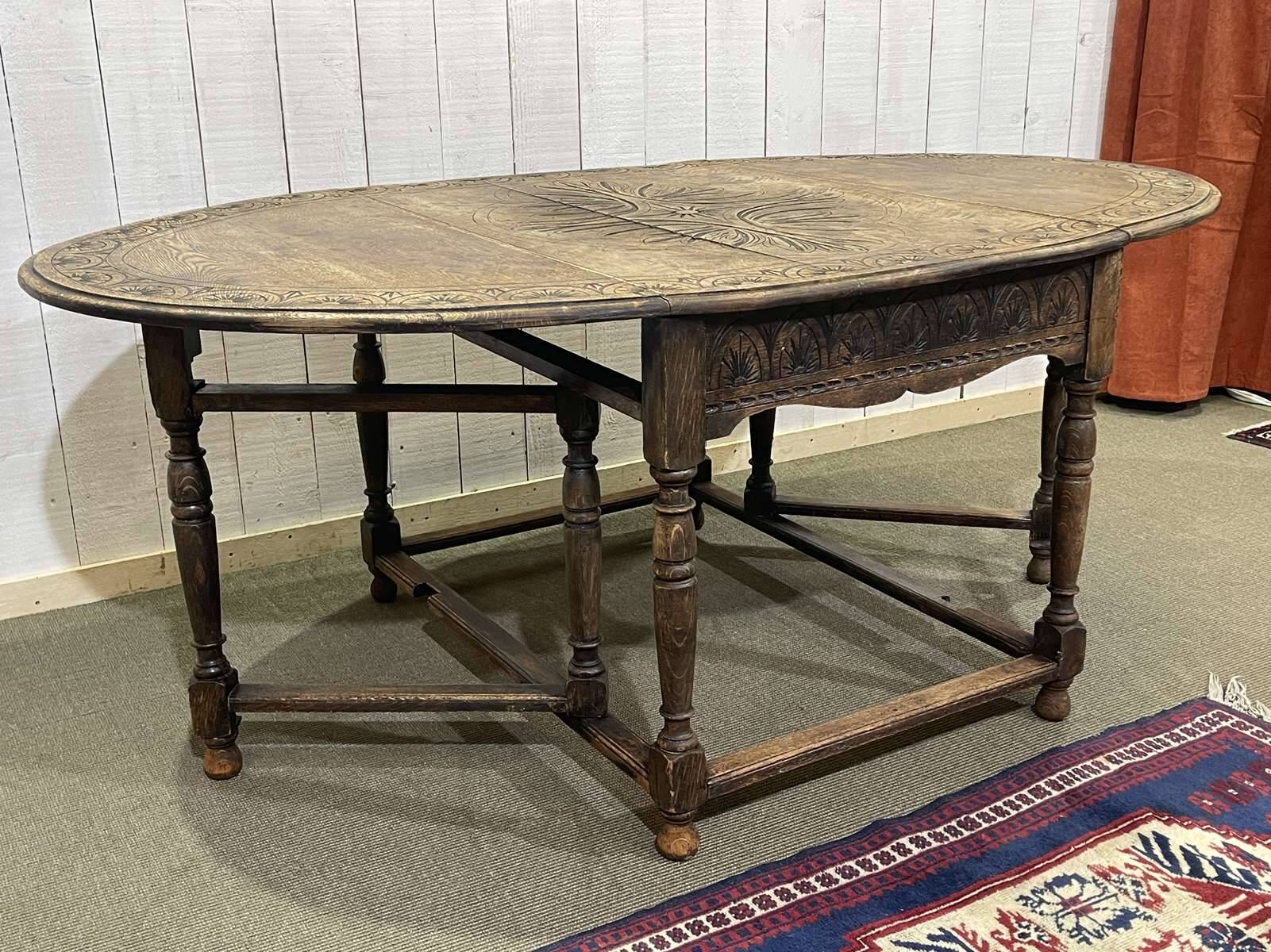 English oak drop-leaf table from the early 20th century