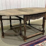 English oak drop-leaf table from the early 20th century