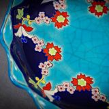 Longwy coupe model Roxane – Floral enamels on a crackled turquoise background