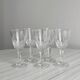5 clear crystal liqueur glasses.