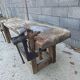 Wooden carpenter's workbench with iron and wooden vice