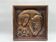 Art Deco bas-relief in Maredsous brasswork.