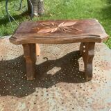 Bench in carved and varnished wood, mountain chalet decoration, old