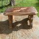 Bench in carved and varnished wood, mountain chalet decoration, old