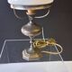 Very pretty lamp in tin with an opaline glass globe in very good condition.