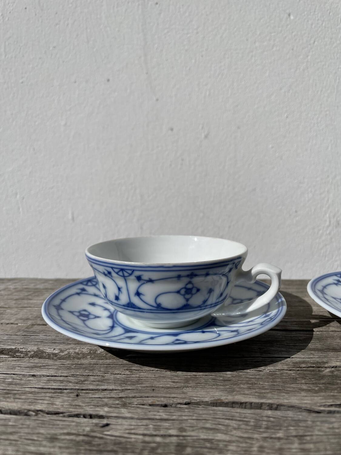 Pair of signed blue porcelain cups