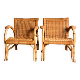 Pair of arco indoor/outdoor rattan armchairs from the 70s.