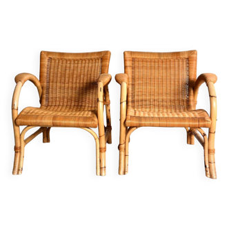 Paire de fauteuils rotin intérieur / extérieur arco des années70.