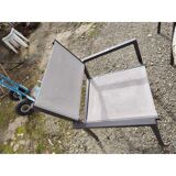 Garden furniture in stone with a vintage 1970s iron base.