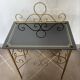 Vintage gilded metal side table, glazed ceramic trays