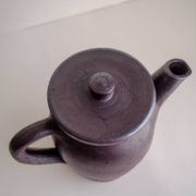 Brown ceramic artisan coffee maker