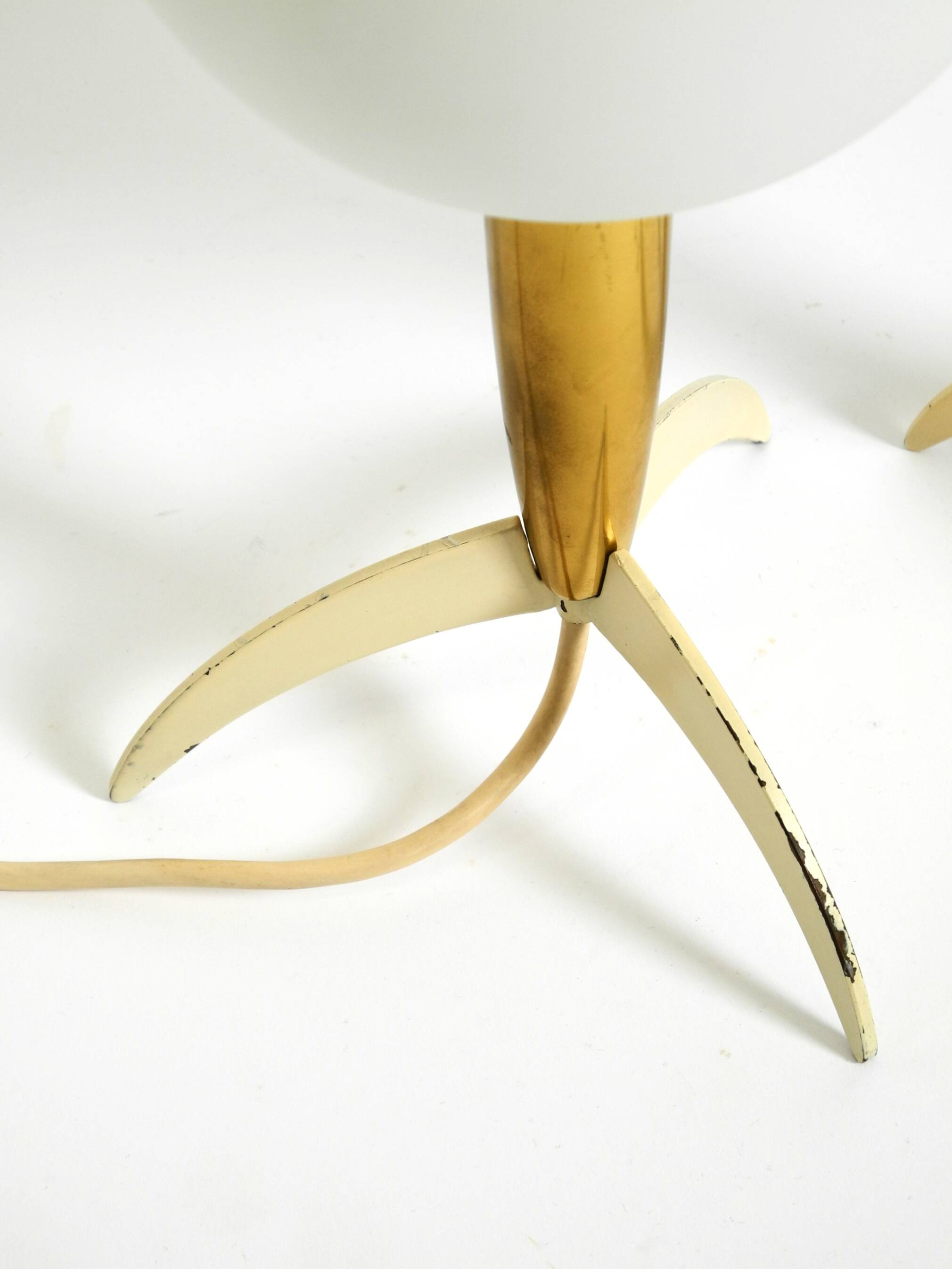 Two Mid-Century Modern rocket table lamps in brass and glass