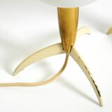 Two Mid-Century Modern rocket table lamps in brass and glass