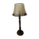 Large vintage wooden floor lamp with parchment shade and pendants.