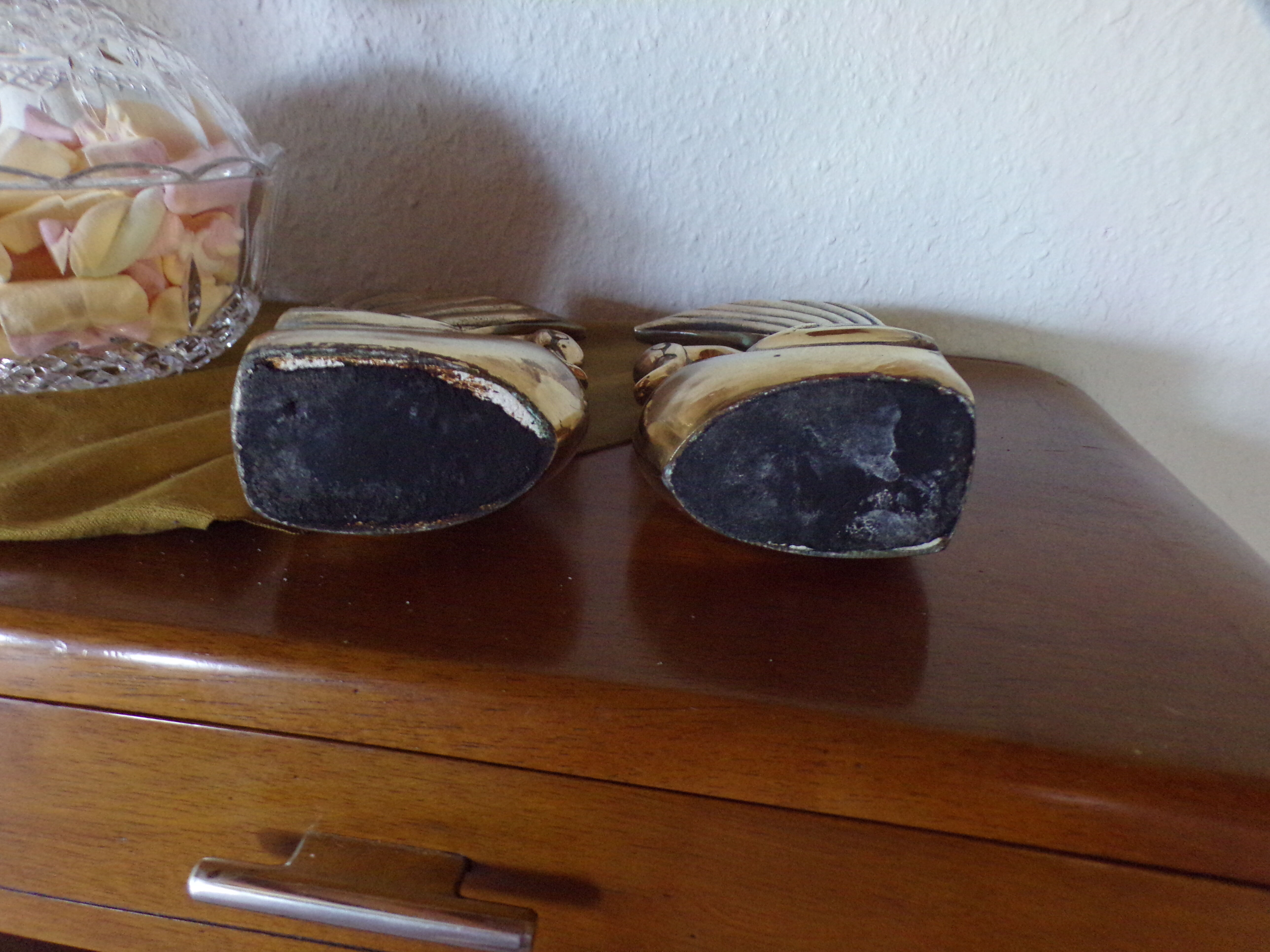 Pair of greenhouse books brass swans