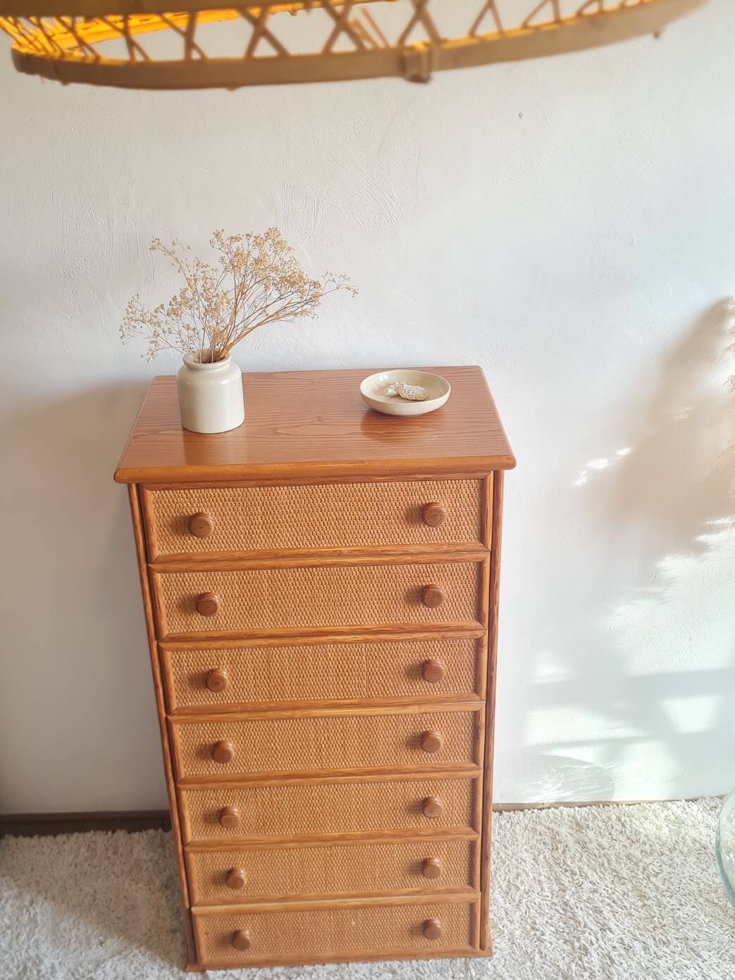 Vintage wicker chest of drawers.