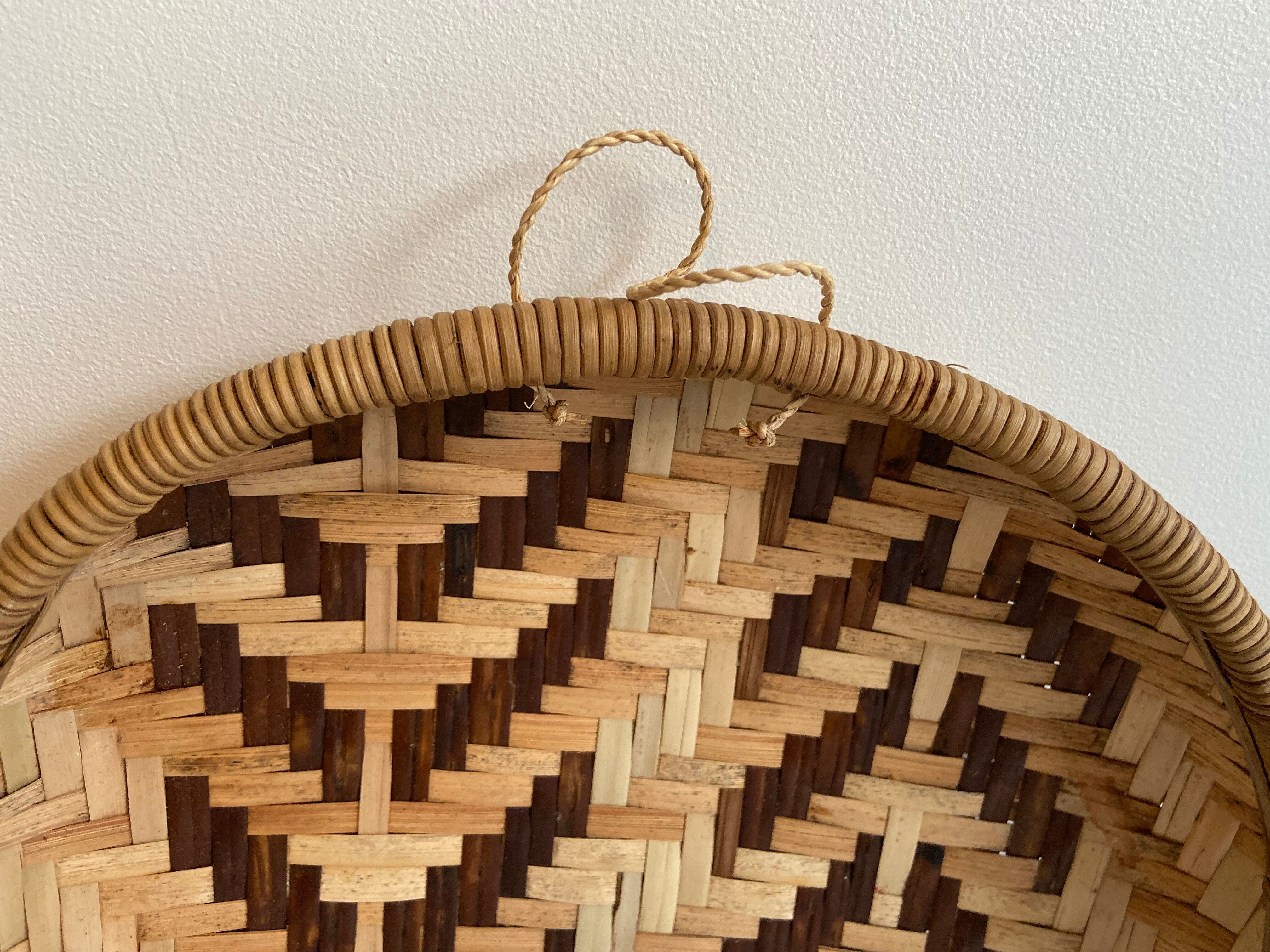 Two-coloured braided wicker basket