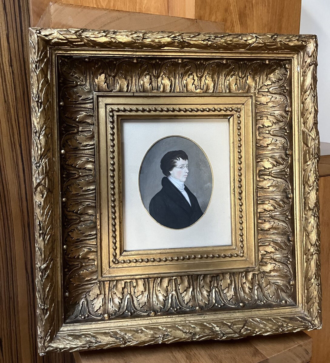 German school (?) of the early 19th century, Portrait of a young man wearing glasses.