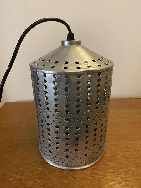 Industrial pendant lamp in perforated gray metal