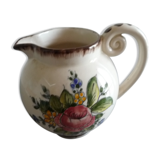 Old water jug in earthenware