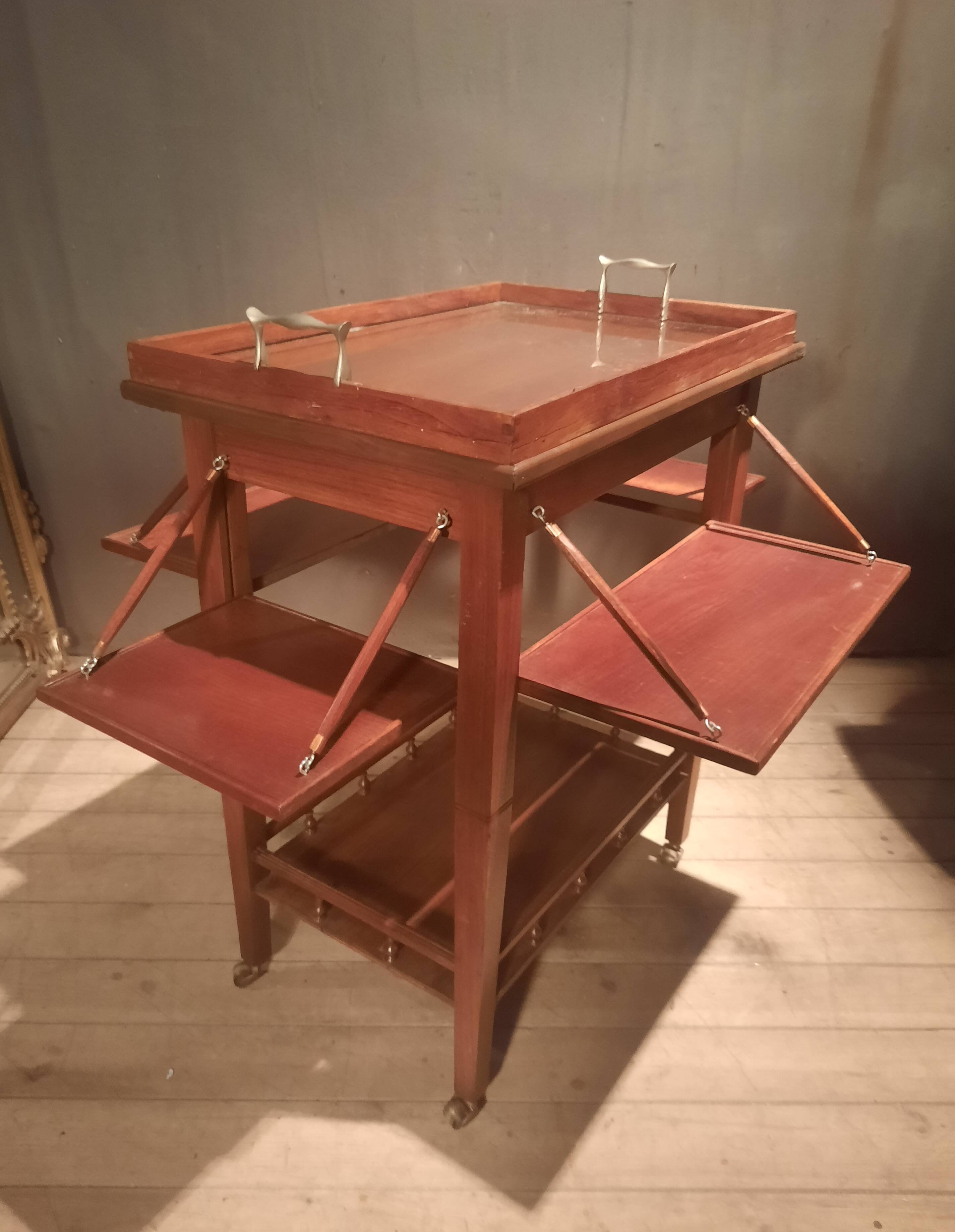 Sideboard with four drop-leaves
