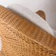 Pair of woven wicker armchairs