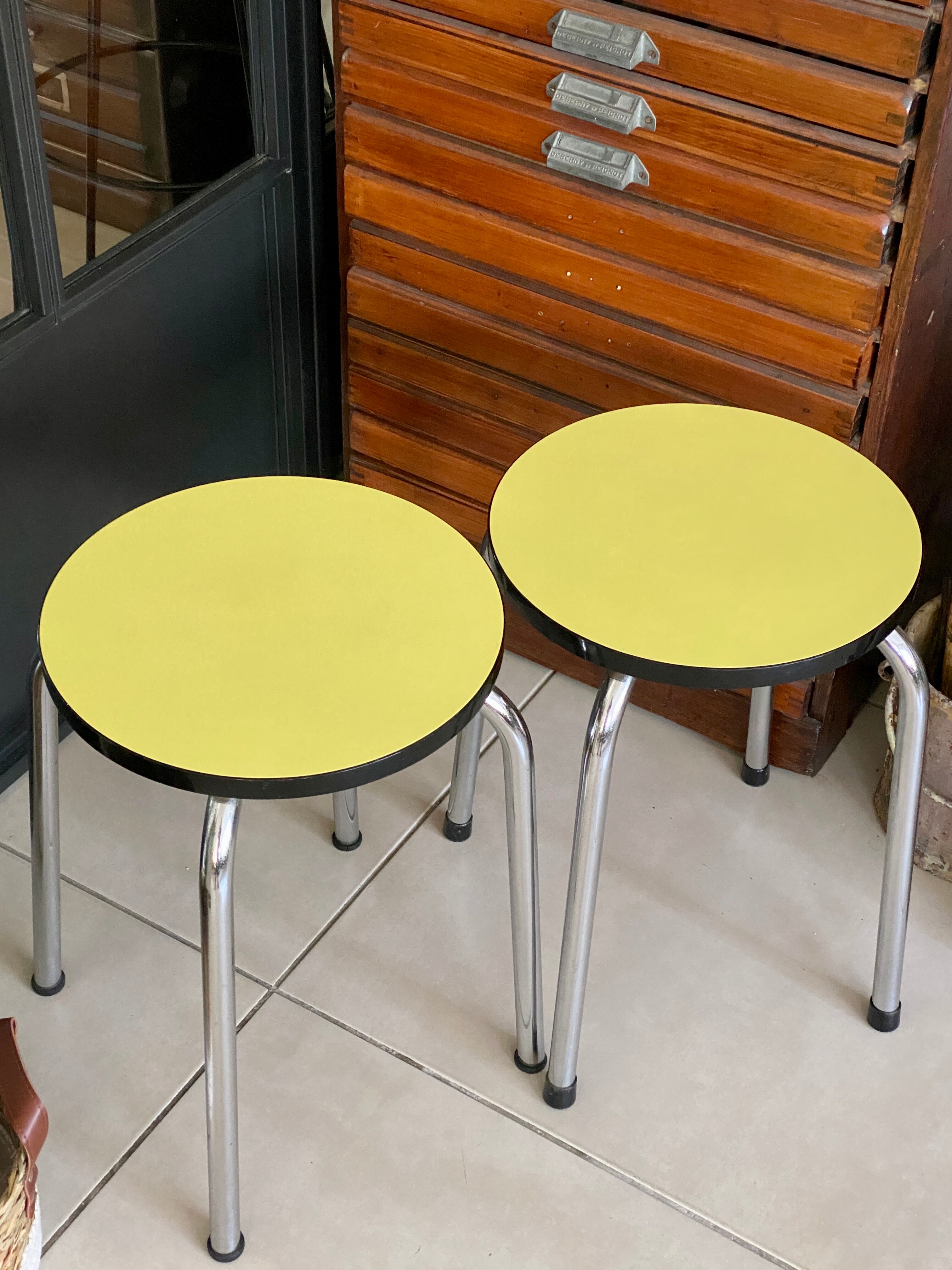 Pair of yellow Formica stools