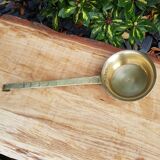 Old brass ladle
