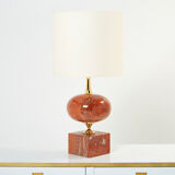 Pair of lamps in red travertine and brass 1970